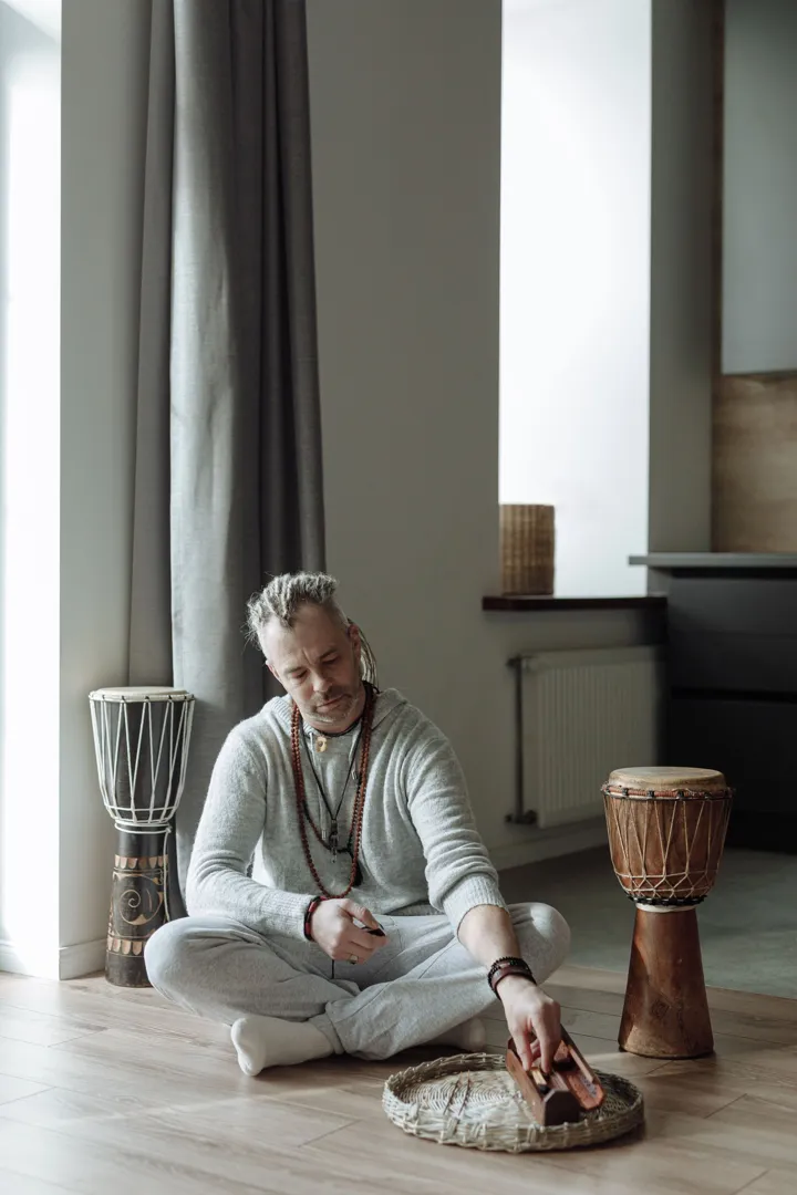 Holistic practitioner with instruments