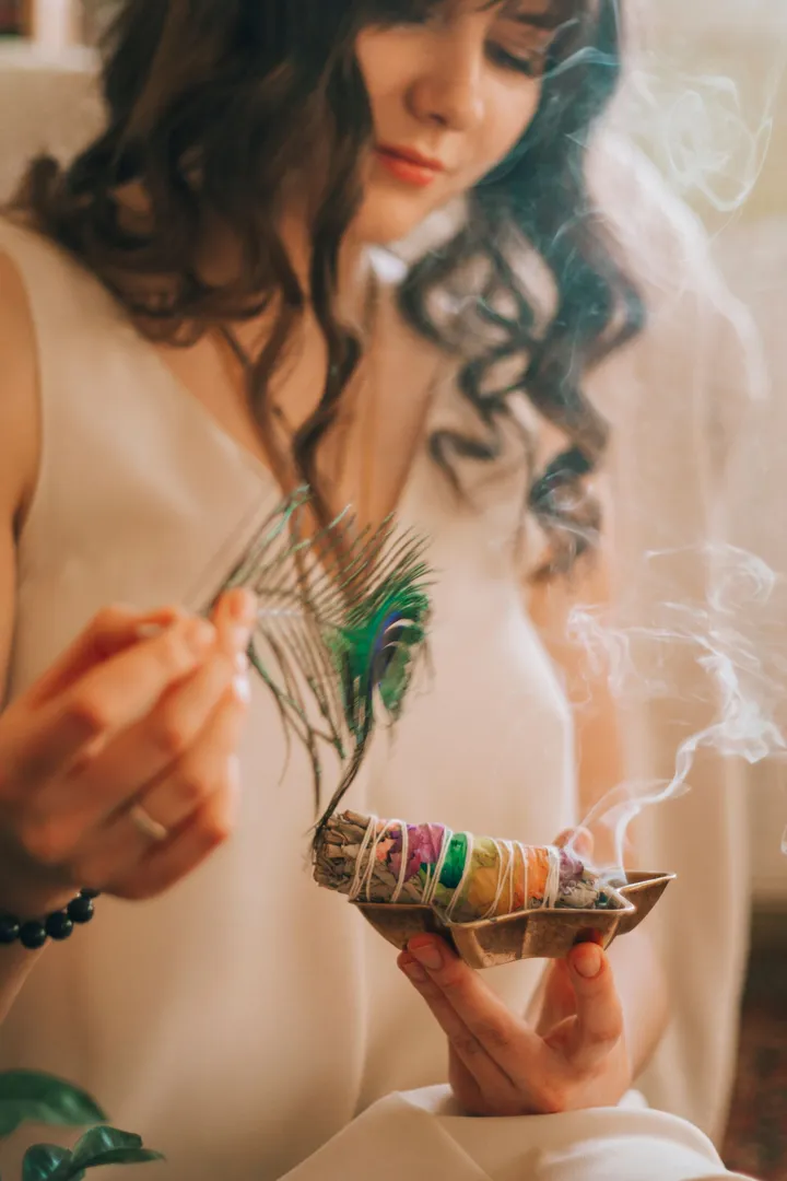 Shamanic practitioner with sage